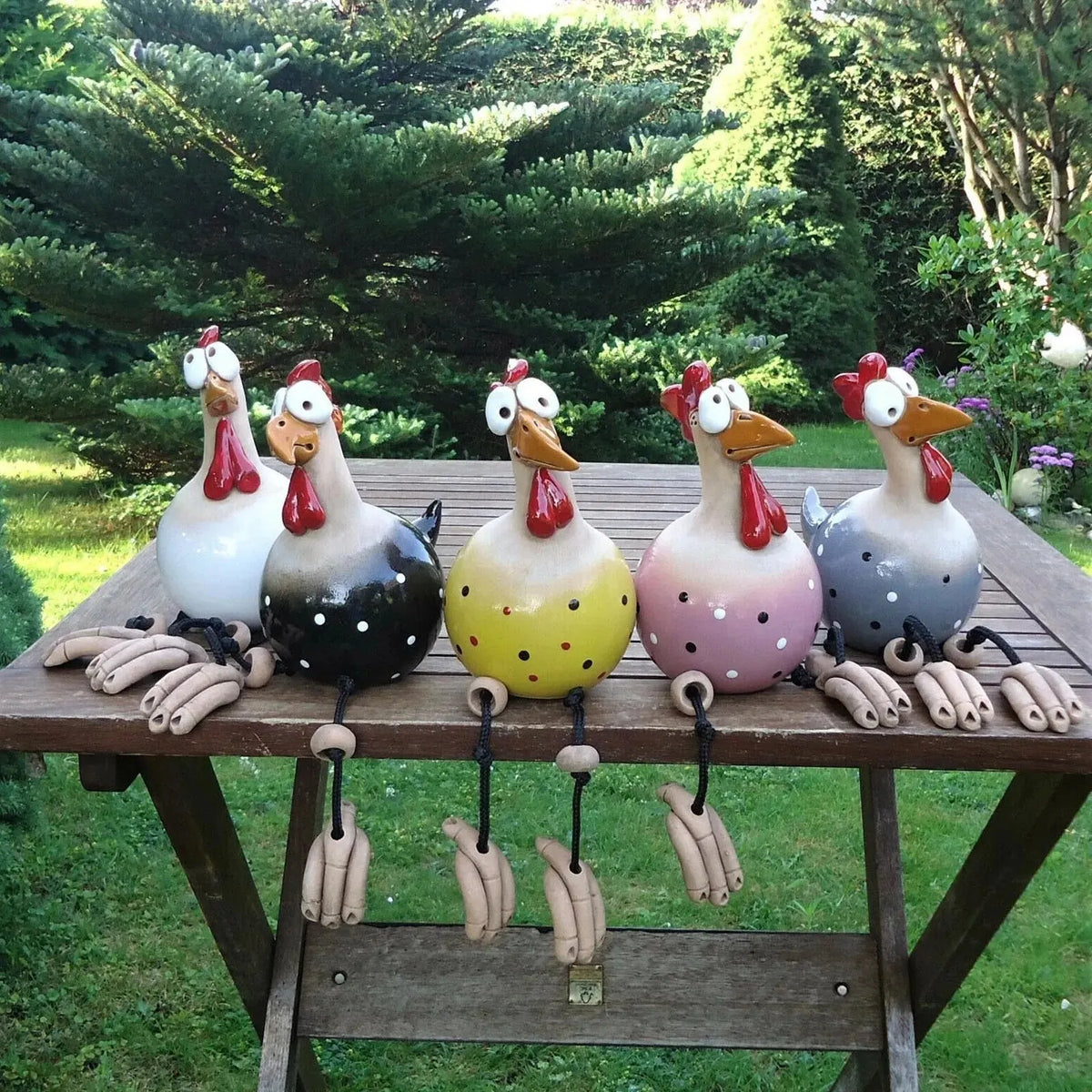 Playful Chicken Garden Statue with Dangling Legs